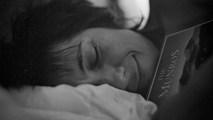 in bed with a book